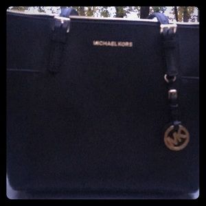 Black travel Michael Kors purse